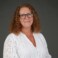 A person with curly hair